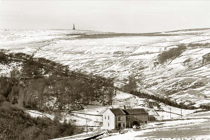Stoodley Pike stands out prominently in a snowy upper Calder Valley